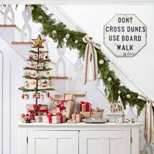 This is a picture caption. 21 Best Staircase Christmas Decorations Holiday Decor For The Banister
