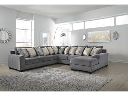 Ashley has some better middle range items and a good bit of 'affordable furniture. Ashley Furniture Castano 13302 66 77 34 17 4 Piece Grey Sectional Sam Levitz Furniture Sectional Sofas