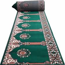 green janamaz rolls for prayer carpet