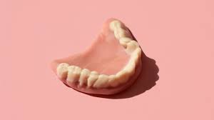denture care how to properly clean and