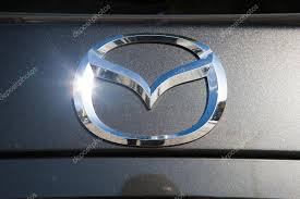 mazda brand logo design in a car