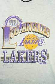 The lakers logo consists of a basketball that depicts the nature and identity of the team, and the stretched lines from the text signifies the fast speed of the team. Original 1992 Nba Los Angeles Lakers Logo Basketball Vintage T Shirt