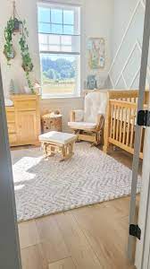 neutral nursery with vinyl flooring