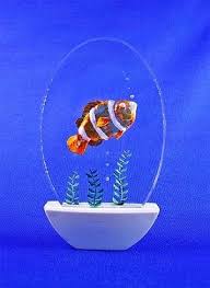 The fish in finding nemo is a cross between that and a fangtooth. Led Lit Hand Carved Clown Fish Night Light Perfect For Those Kids Who Love Finding Nemo Clown Fish Night Light Hand Carved