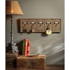 There's a strong feeling of being in an organic place, somewhere time has forgotten. Rustic Key Rack Wall Decor Pink Pig