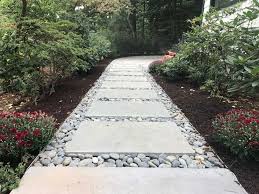 For you driveway paving, pool paving, front steps or patio paving; Add Style To Your Paver Patio And Walkway With Pebbles And Rocks In Melville Ny