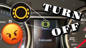 how to disable brake pad warning light