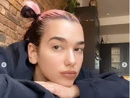In the first, regular blonde hair. Dua Lipa Says She No Longer Uses Instagram After Experiencing Bullying Kiss
