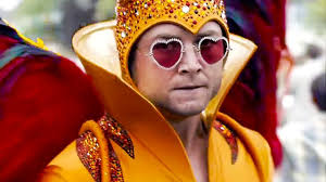 Rocketman is a 2019 biographical musical fantasy drama film based on the life and music of british musician elton john.directed by dexter fletcher and written by lee hall, it stars taron egerton as john, with jamie bell as bernie taupin, richard madden as john reid, and bryce dallas howard as sheila eileen, john's mother. Rocketman Trailer 2019 Elton John Biopic Movie Youtube