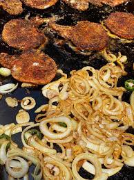 griddle pork chops and onions two a