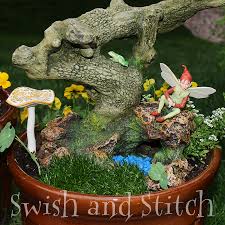 outside and plant a fairy garden