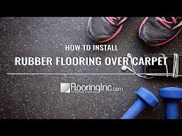 install rubber flooring over carpet