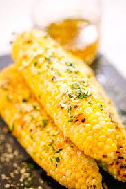 Garlic Parmesan Grilled Corn On The Cob It Is A Keeper gambar png