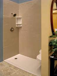 Get free shipping on qualified shower wall panels or buy online pick up in store today in the bath department. Solid Surface Shower Bases Wall Panel Kits Innovate Building Solutions Bathroom Shower Panels Shower Wall Panels Corian Shower Walls