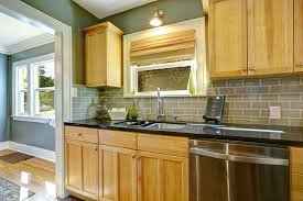 maple kitchen cabinets with tile back