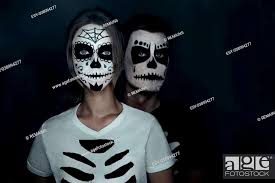 skeletons and sugar skull makeup