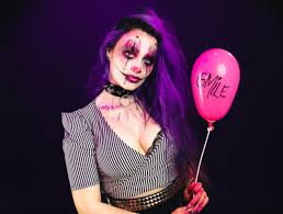 young woman with scary halloween makeup