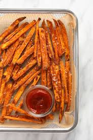 Arrange potatoes in one layer on an unoiled baking sheet. Crispy Baked Sweet Potato Fries Fit Foodie Finds