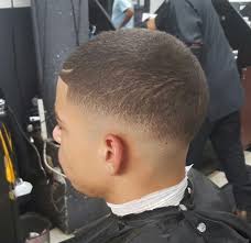 A buzzcut can be a trendy, low care option for many men. Onyx Barbers Low Skin Fade Skin Barber