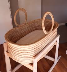 moses basket with s and kids