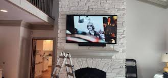 Tv Mounting Above A Stone Fireplace