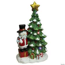 Sporting a tall top hat and warm scarf, this smiling snowman with holly berry twig arms is shaped by beautiful flocked tree branches filled by glowing white lights. Northlight 23 Red And Green Pre Lit Led Tree With Santa Snowman Musical Christmas Tabletop Decor Oriental Trading