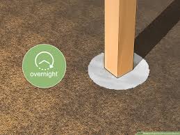 how to cement a post in the ground 9