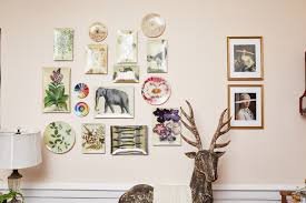 Hanging art or photos on the walls can make a house feel more like a home, personalizing your space. How To Hang Plates On A Wall