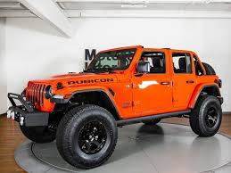 Check spelling or type a new query. Orange Jeep Rubicon