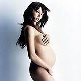 hitomi shows off maternity figure on cover of new album - Japan Today