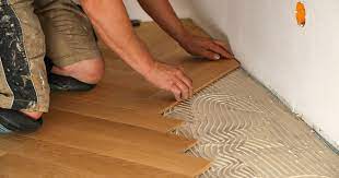 install wood flooring over tiled floors