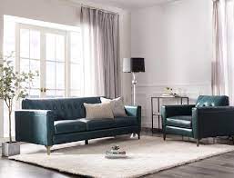 teal leather sofa with matching chair
