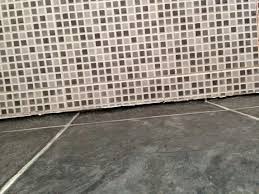 vinyl floor and bottom of wall tiles