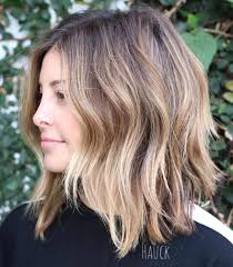 Brown hair with highlights, it allows the hair to stay natural as if it were opened from the sun. 50 Best Medium Length Hairstyles For 2021 Hair Adviser