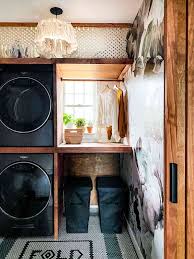 laundry rooms with stacked washer dryers