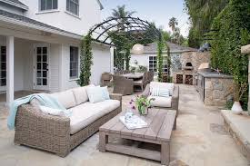 Arched Pergola With Outdoor Kitchen And