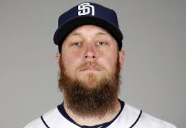 The face of baseball is entirely obscured by its beard