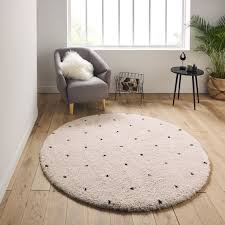 ava berber style round rug in polka dot