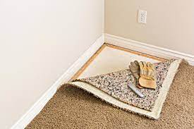 how to remove glued carpet from wood
