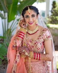 elegant indian bride in pink lehenga