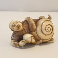 I did not carve this piece material: Netsuke 1 Marine Ivory A Man And A Giant Snail Catawiki