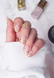 dainty gold leaf nails