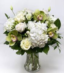 Spin the vase around as you go and thread the hydrangea flowers through strategically. Classic White Tall Vase Arrangement True Flowers