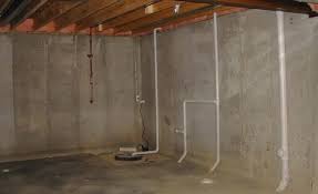 what causes moisture in basement walls