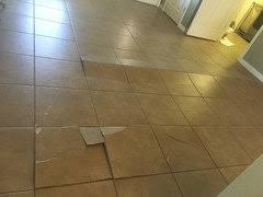 ceramic tile floor popping up