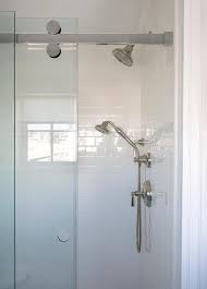 Subway Tiled Shower With Glass Doors On