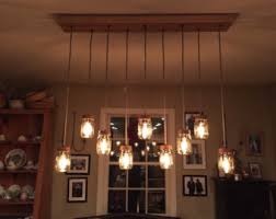 Inject a little creativity into it and you've got yourself a chandelier. Upcycled Chandelier Etsy