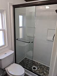 My personal preference is a solid surface shower pan with either tile or solid surface walls. Bestbath Tile Shower Pan Shower Floor Remodel Finish 2 Bestbath