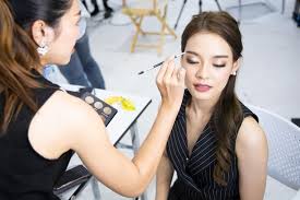 premium photo makeup artist preparing