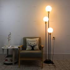 2020 Modern Simple Glass Ball Floor Lamp Living Room Bedside Lamp Creative Personality Fashionable Long Led Floor Lamp Llfa From Nimiled 295 62 Dhgate Com